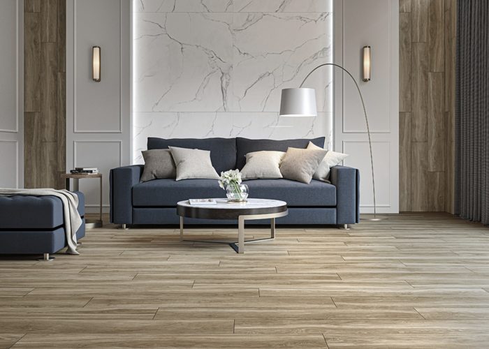 Taupe Matt Floor Tile in the living area paired with navy blue sofa
